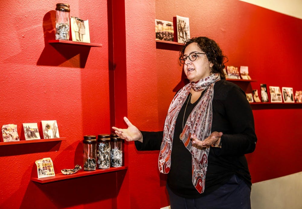 UNM grad student Fatemeh Baigmoradi talks about her exhibition ?Hard to Kill? at the CFA downtown studio on Monday, Oct. 9, 2017. Baigmoradi?s journey as a foreign exchange student and life in the U.S. is an inspiration for her exhibition. 