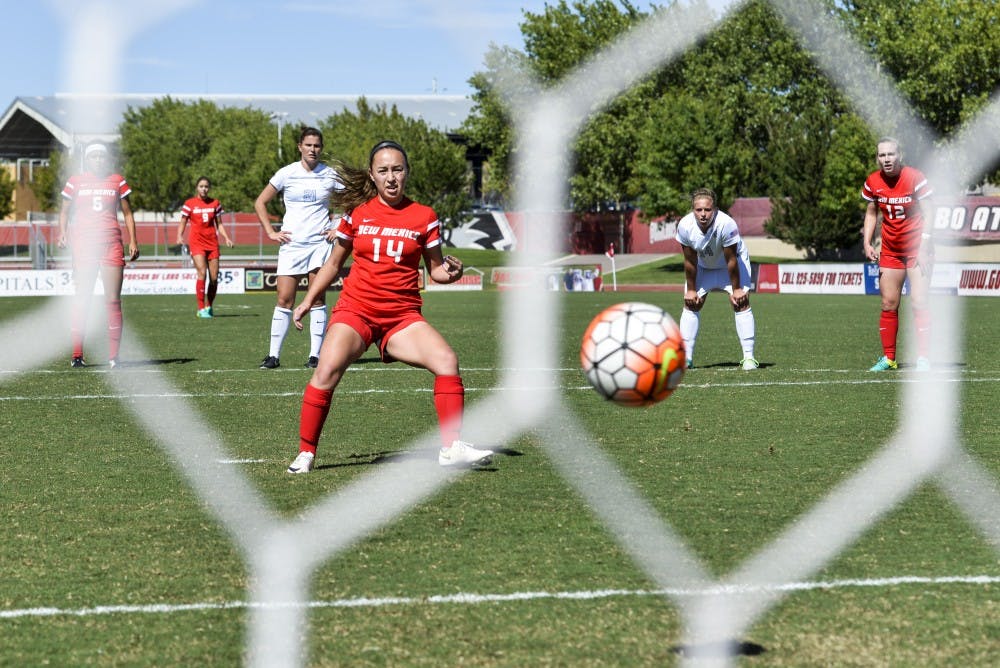 Junior midfielder Claire Lynch fires a penalty shot past a Air Force goal keeper while both teams stand back and watch Sunday Sept. 25, 2016 at the UNM Soccer Complex. The Lobos will compete against San Jose State this Friday.&nbsp;