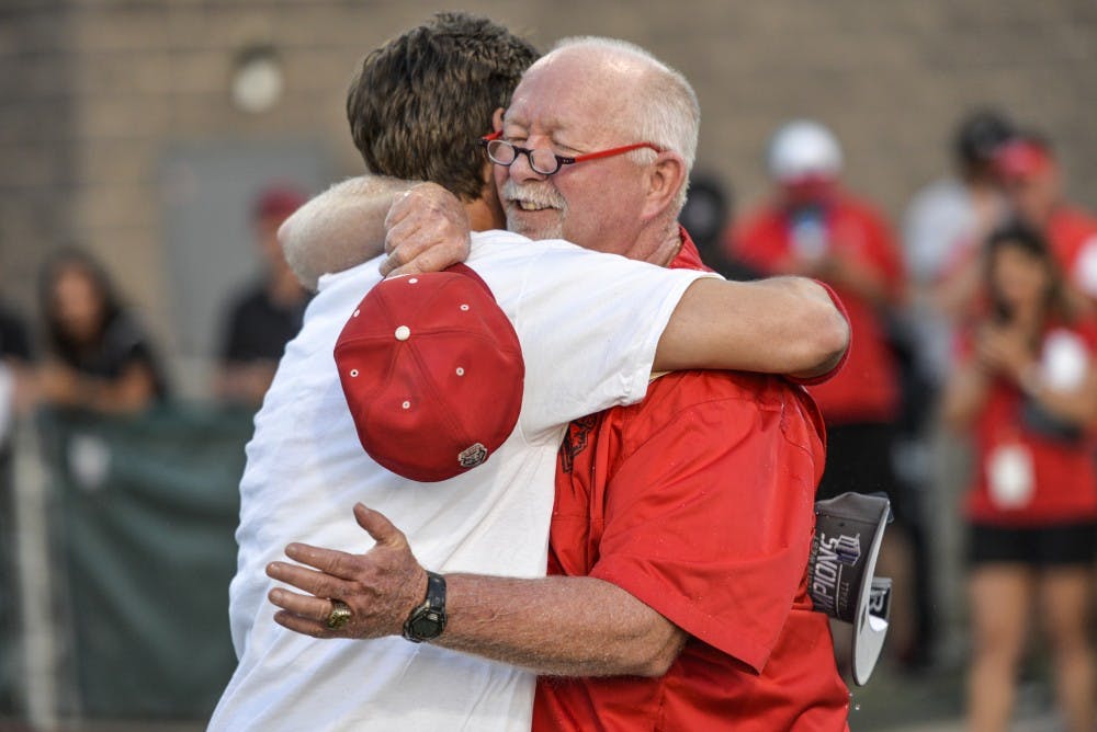 Sophomore outfielder Luis Gonzalez hugs head baseball coach Ray Birmingham after beating Nevada in the Mountain West Championship Saturday May 28, 2016 at Santa Ana Star Field. The Lobos will play Dallas Baptist in the regional conference this Friday in Lubbock, Texas.