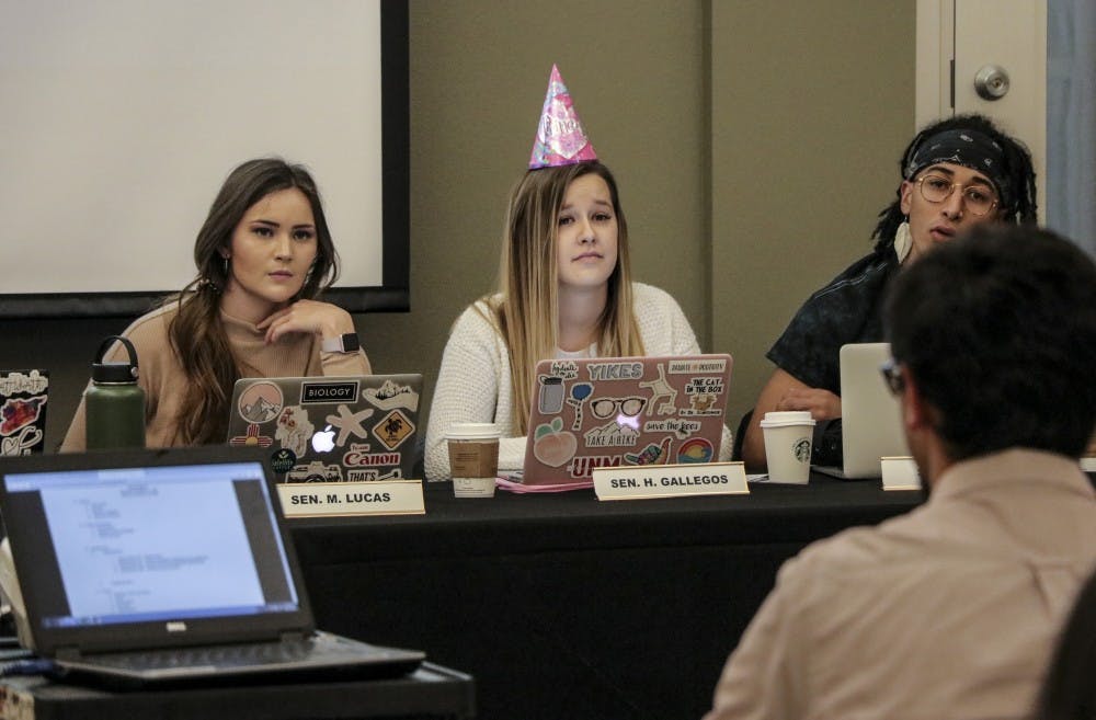 ASUNM Senator Holly Gallegos and other senators question a member of the public about expenses for an upcoming event on Halloween night Oct. 31, 2018.