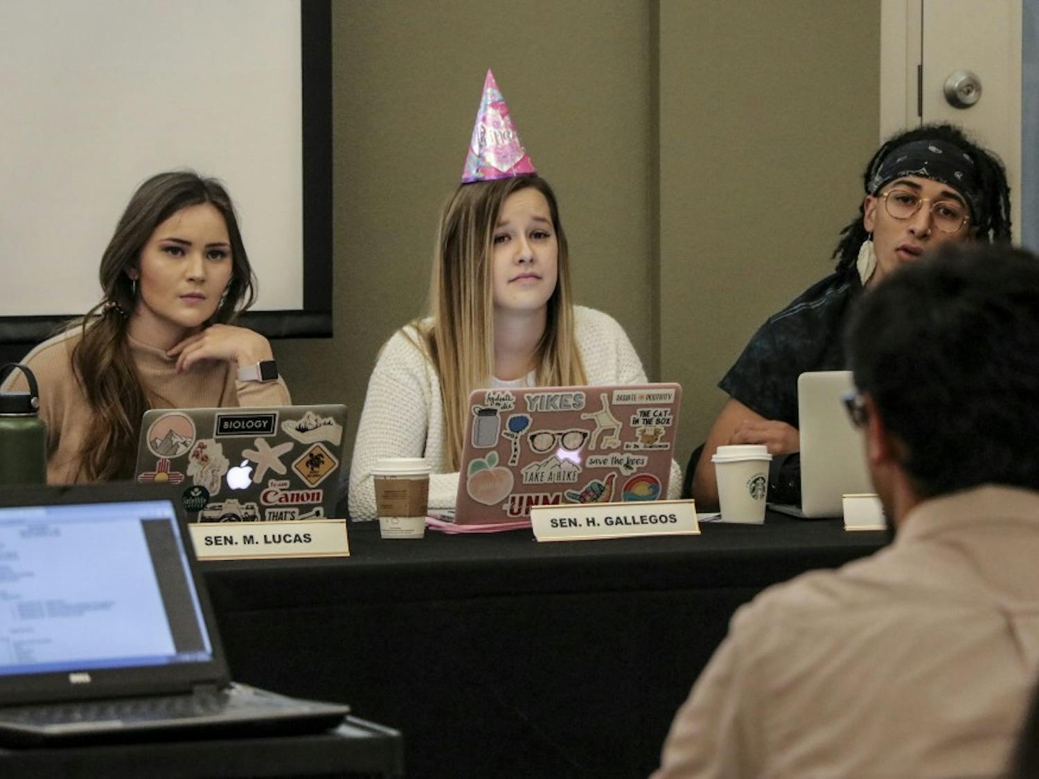 ASUNM Senator Holly Gallegos and other senators question a member of the public about expenses for an upcoming event on Halloween night Oct. 31, 2018.