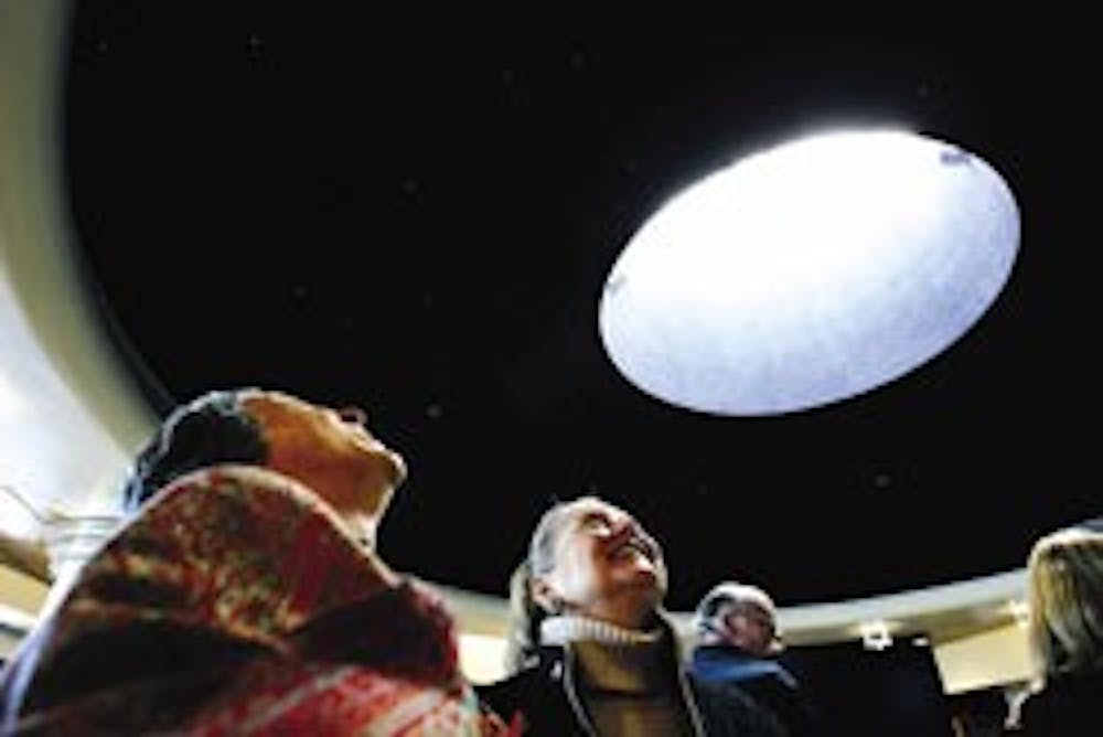 New Mexico first lady Barbara Richardson, center, looks at the ceiling of the Star Wars-themed infusion center in the Carrie Tingley Hospital on Saturday.