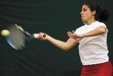 Ola Abou-Zekry hits a forehand during Thursday's match against New Mexico State's Zeljka Juricek at the UNM Tennis Complex. Abou-Zekry won 6-1, 6-2, and the Lobos won 7-0.