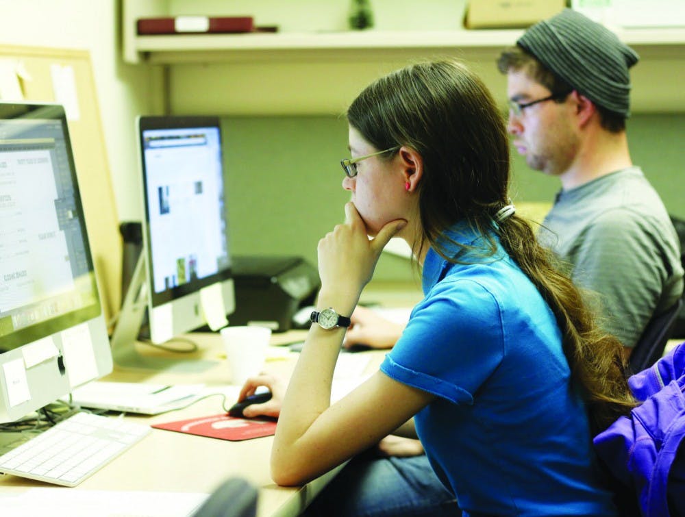 Members of the student-ran publication Scribendi work at their office on April 5, 2016. Scribendi, which has been around for 30 years, is still looking to the community to raise funds to make publication this year.