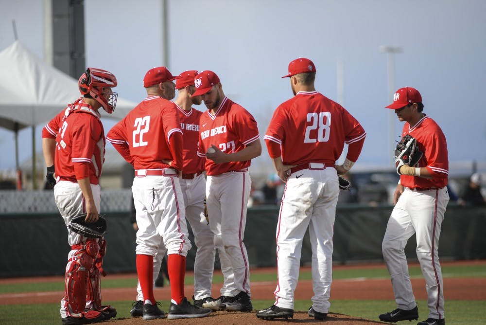 The Lobos baseball team meets together on the pitching mound during their game against Binghamton Sunday, Feb. 19, 2017 at Santa Ana Star Field. The Lobos will face off with San Jose State this weekend at home.