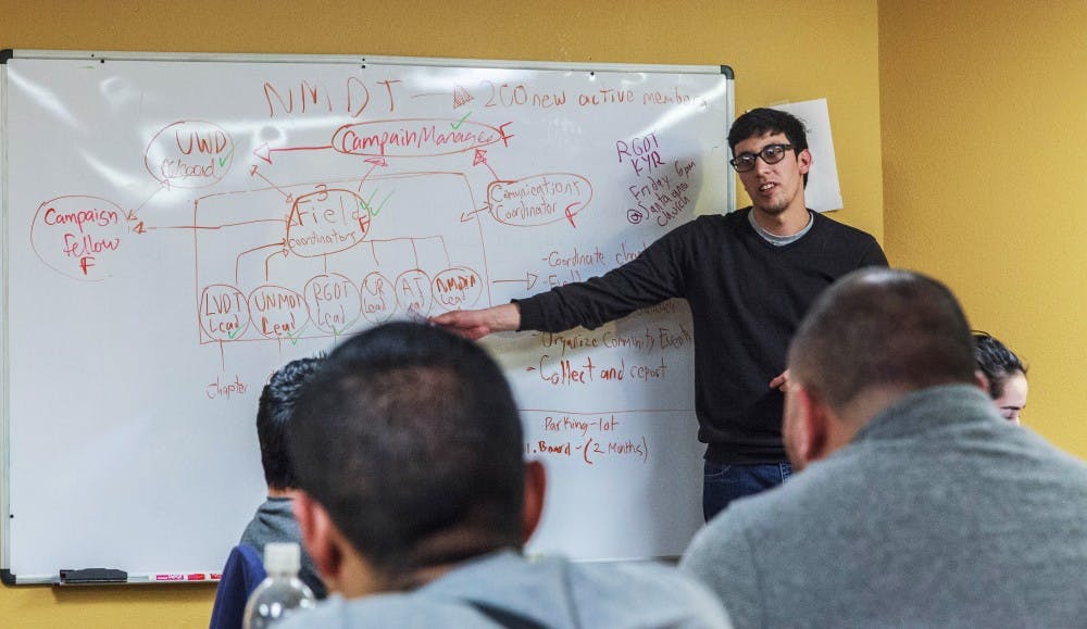 Felipe Rodriguez, Field Coordinator of the NM Dream Team and undergraduate senior student studying psychology at UNM, instructs Dream Team members in organizing strategies under a Trump administration. Rodriguez says that having a sanctuary campus at UNM is a necessity&nbsp;given the changing political climate.&nbsp;