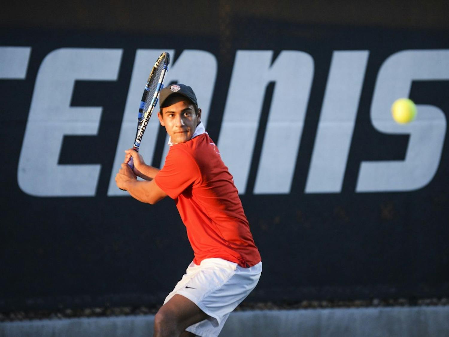 Junior Jorge Escutia eyes the ball during a match Friday, Feb. 26, 2016 at the McKinnon Family Tennis Stadium. The Lobos lost to both Texas Tech and Arizona this past Saturday in Lake Nona, Florida.