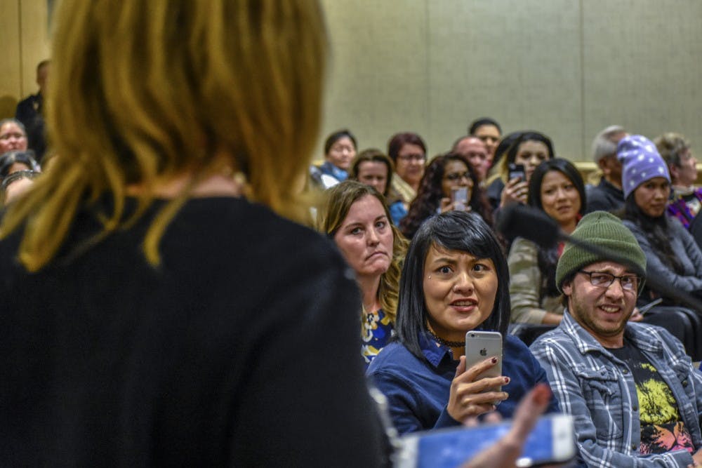 Danielle Baker responds to comments from the crowd during public comment at an Albuquerque School Board meeting on Wednesday, Dec. 5, 2018. The meeting focused on an APS teacher cutting a Native American student's hair about two months prior.