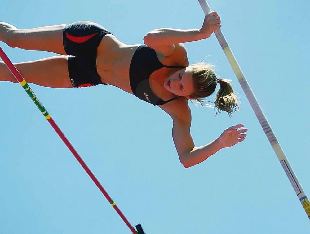 Kelsie Hendry pole vaults a height of 4.15 meters at the Don Kirby Memorial Invitational track meet at the UNM Track and Field Complex on Saturday. 