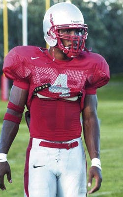 Lobo wide receiver Marcus Smith scans the field during a team practice Thursday at the Lobo football practice field.