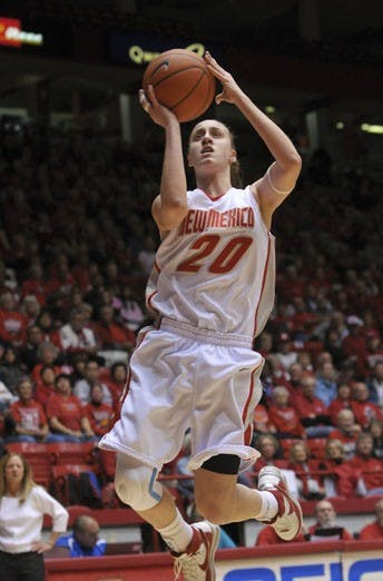 Sara Halasz hangs in the air during UNM's 79-33 drubbing of Air Force on Wednesday at The Pit. Halasz had nine points on 4-of-5 shooting.