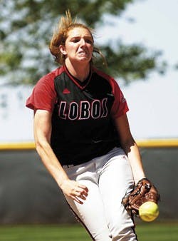 Freshmen pitcher Jen Mendenhall pitches against Utah during the first game of the double-header at Lobo Field on Sunday. The Lobos won the first game 5-2, and lost the second 5-2.