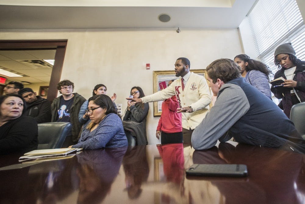Matthrew Hill, center, expresses to UNM administration members why he believes Milo Yiannopoulos should not be brought to UNM on&nbsp;Thursday, Jan. 19, 2017.&nbsp;