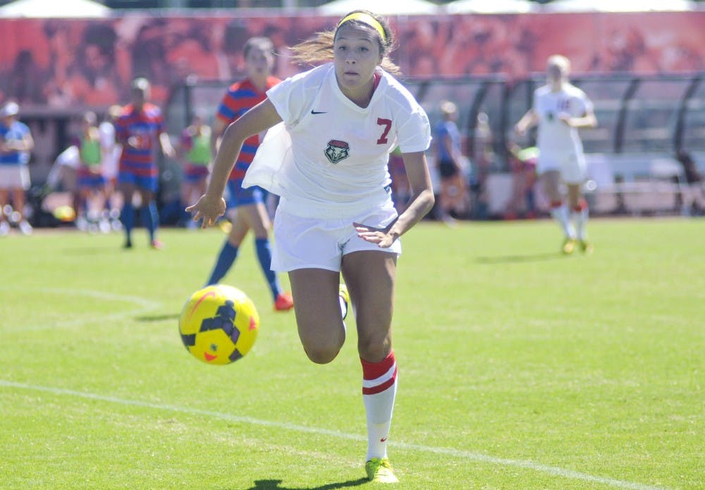 Lobo sophomore midfielder Ruth Bruciaga keeps control of the ball at the UNM Soccer Complex against Florida on Sunday, Sept. 14. Last week, Burciaga scored three goals against New Mexico State and with this, she was named Mountain West Offensive Player of the Week.