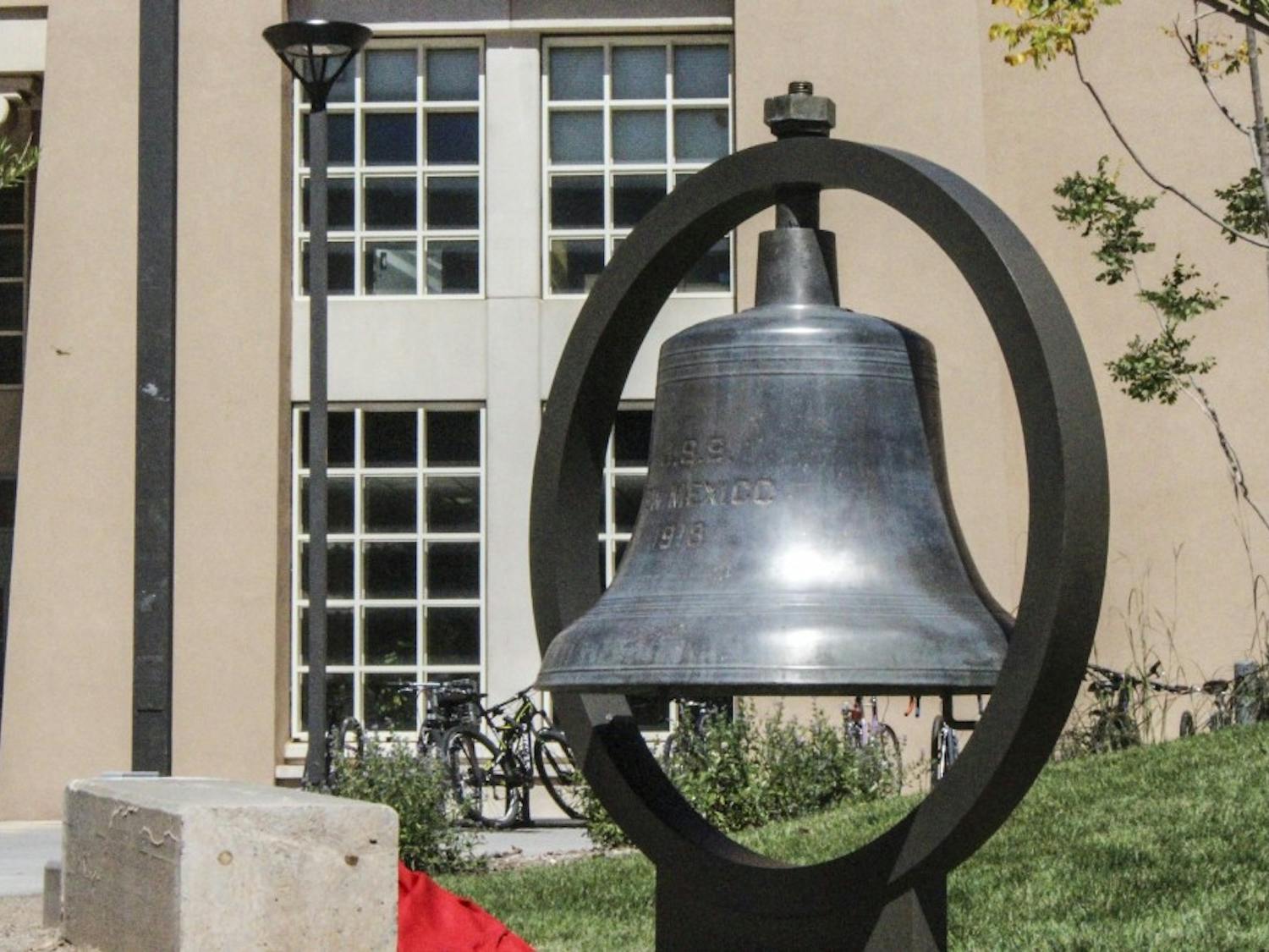 The USS New Mexico bell in front of Zimmerman Library after its rededication ceremony on Thursday, Sep 13. The bell is one of two that were aboard the ship. The bell would sound alarms or be used to bury at sea those killed in action by the kamikaze attacks.