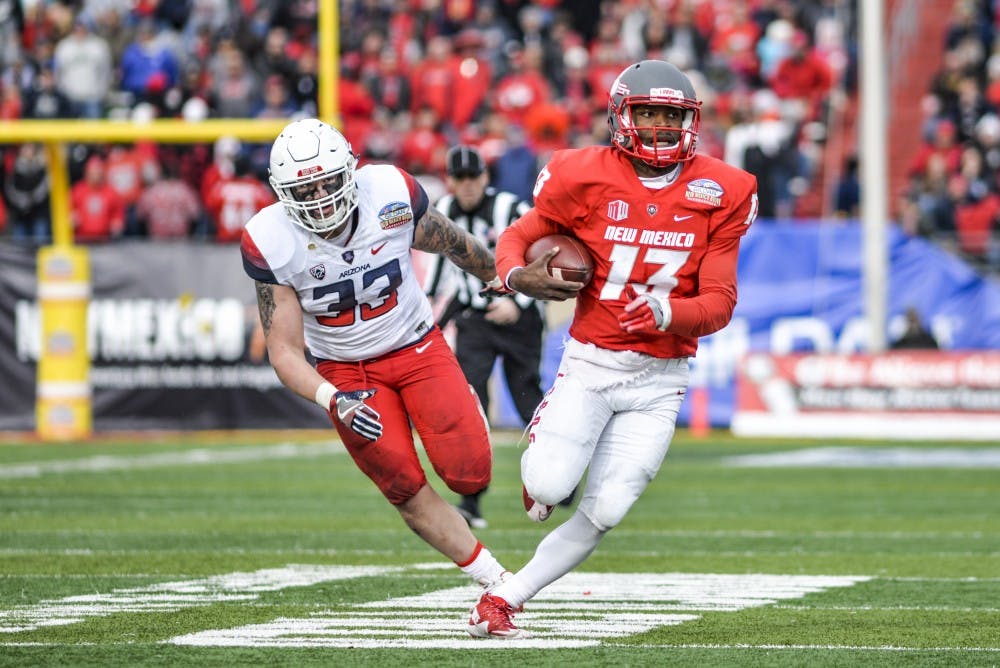 Redshirt quarterback Lamar Jordan runs down the field during the 10th Gildan New Mexico Bowl on Saturday, December 19, 2016 at University Stadium. Jordan is one of four captains appointed for the 2016 fall season. Fellow quarterback Austin Apodaca along with Dakota Cox and Daniel Henry round out the four captains.
