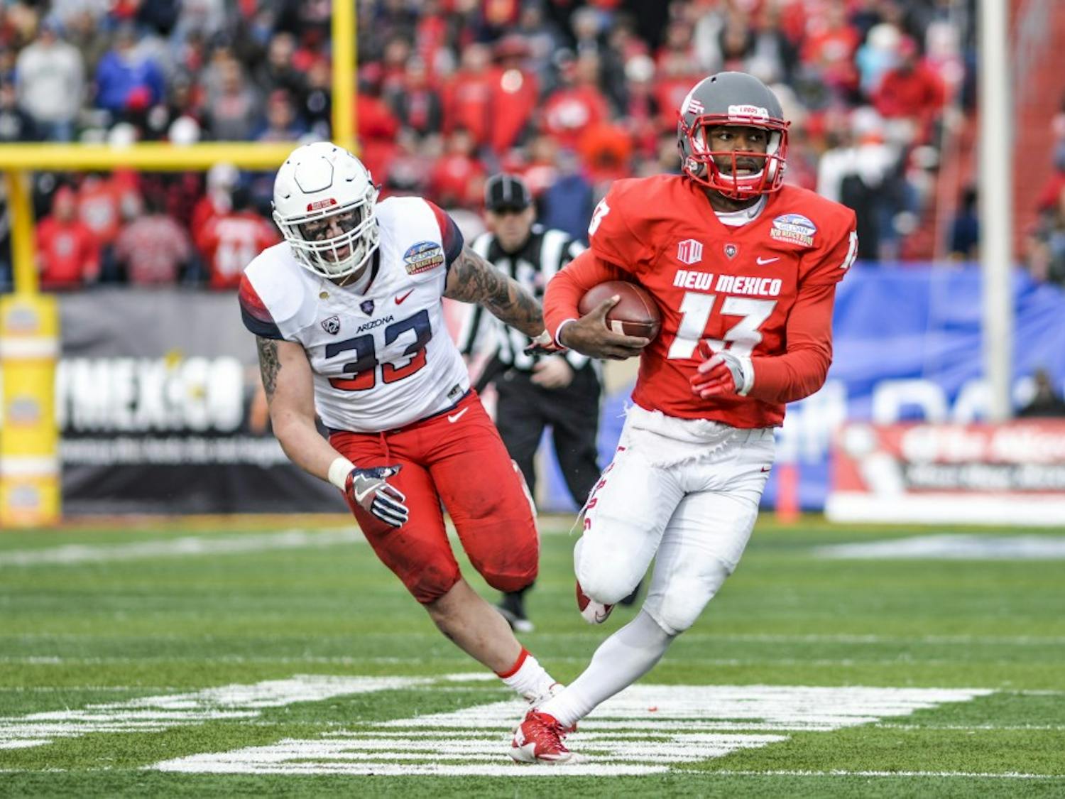Redshirt quarterback Lamar Jordan runs down the field during the 10th Gildan New Mexico Bowl on Saturday, December 19, 2016 at University Stadium. Jordan is one of four captains appointed for the 2016 fall season. Fellow quarterback Austin Apodaca along with Dakota Cox and Daniel Henry round out the four captains.