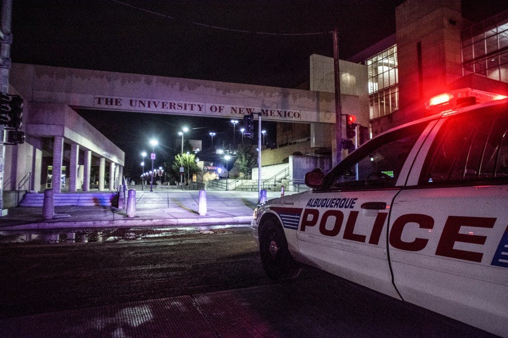 An APD vehicle sits in the middle of the intersection of Central Ave. and Cornell Dr.
