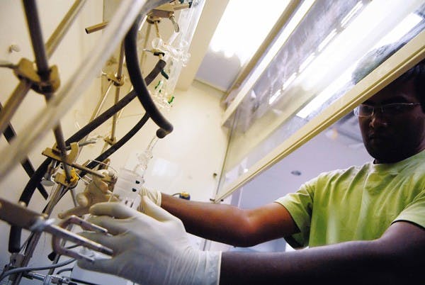 Student Krishnaprasad Sankar works on nano-crystals in a Center for High Technology Materials lab on Wednesday.