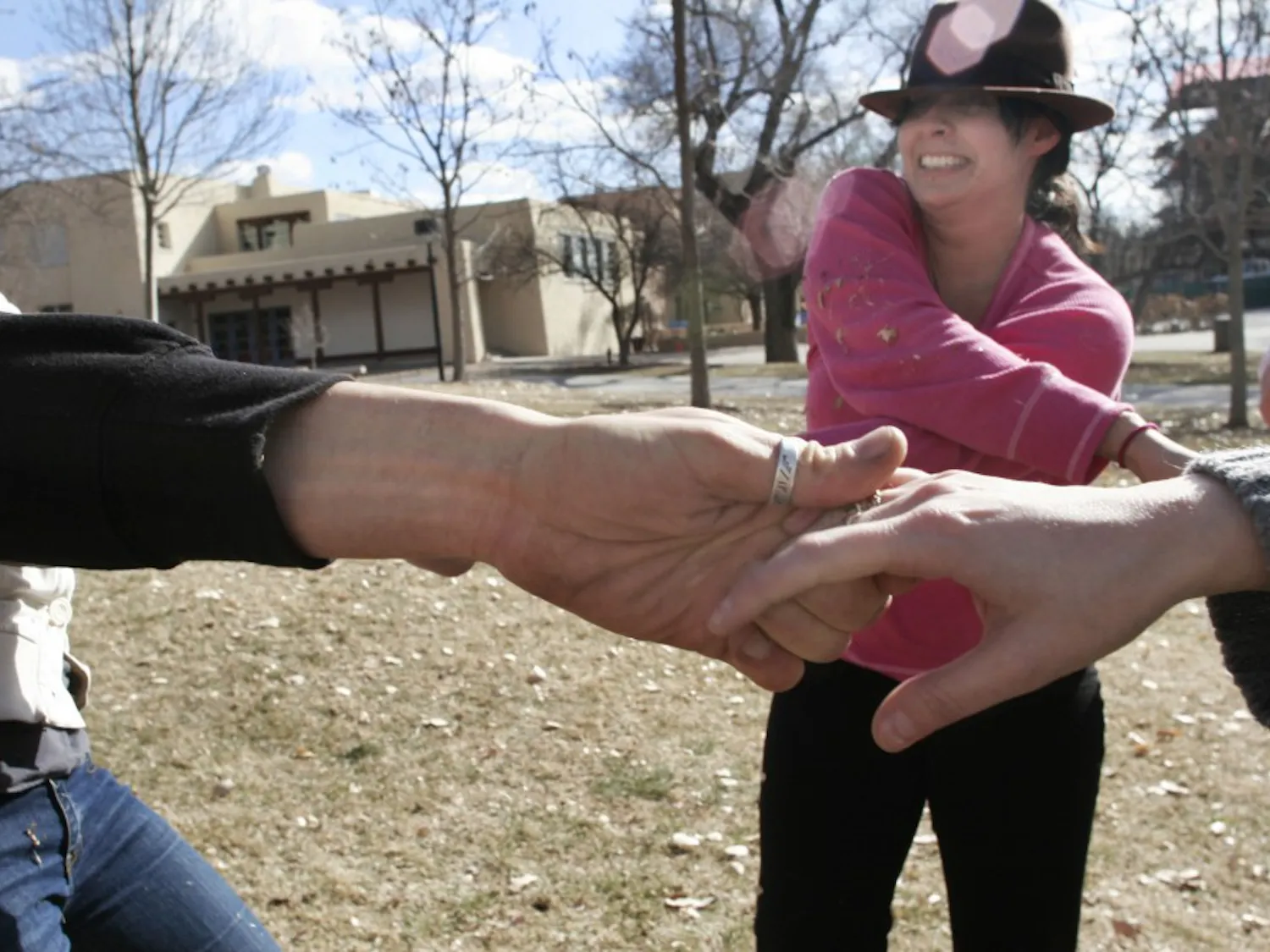 Students Kristen Krehbiel and Bella Robles perform a dance number February 16 near the Duck Pond for their Image and Movement class. The class will perform another piece called “Interrupted” in front of the Bookstore on Thursday at 8:30 p.m.