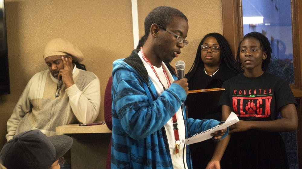 Aaron Alexis shares his experience about the challenges he faces being an African American student. The meeting was held at African American Student Services where students expressed issues with racism to UNM faculty members including Provost Abdallah.&nbsp;