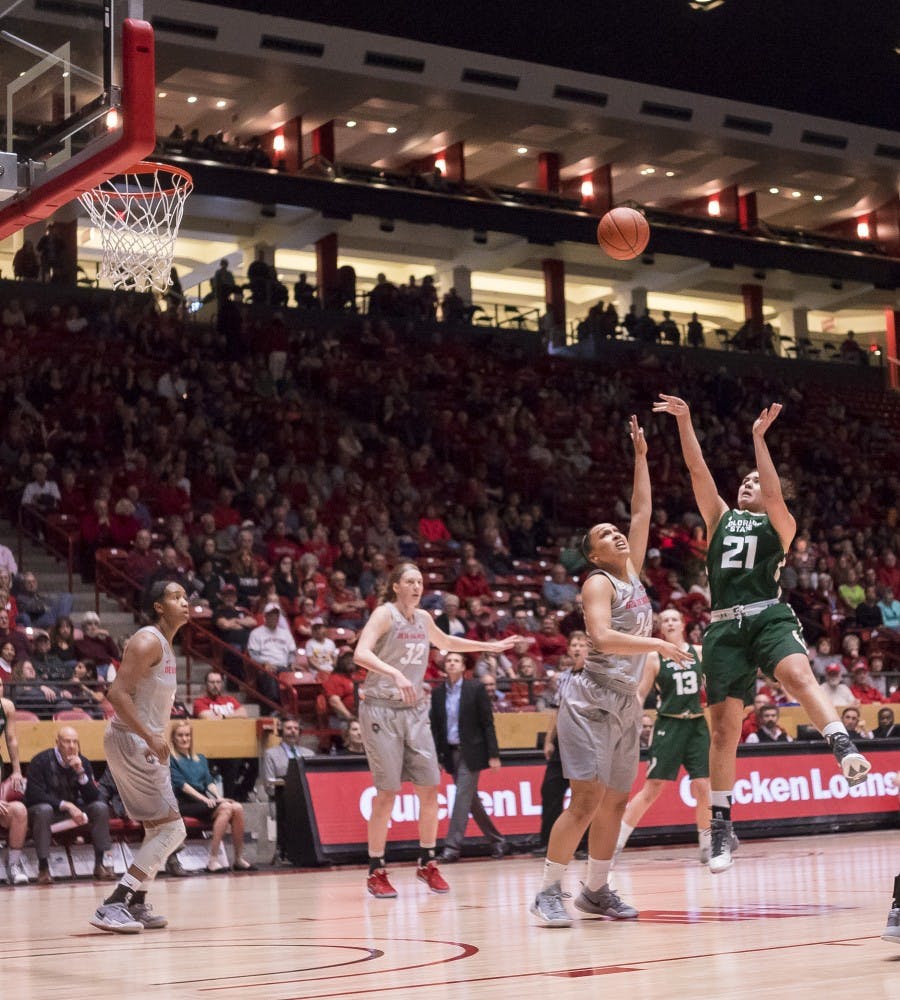 Colorado State guard Myanne Hamm shoots over Lobo defender Jayda Bovero on  Saturday, Jan. 14, 2016 at WisePies Arena. The Lobos lost to Colorado State 78-63.