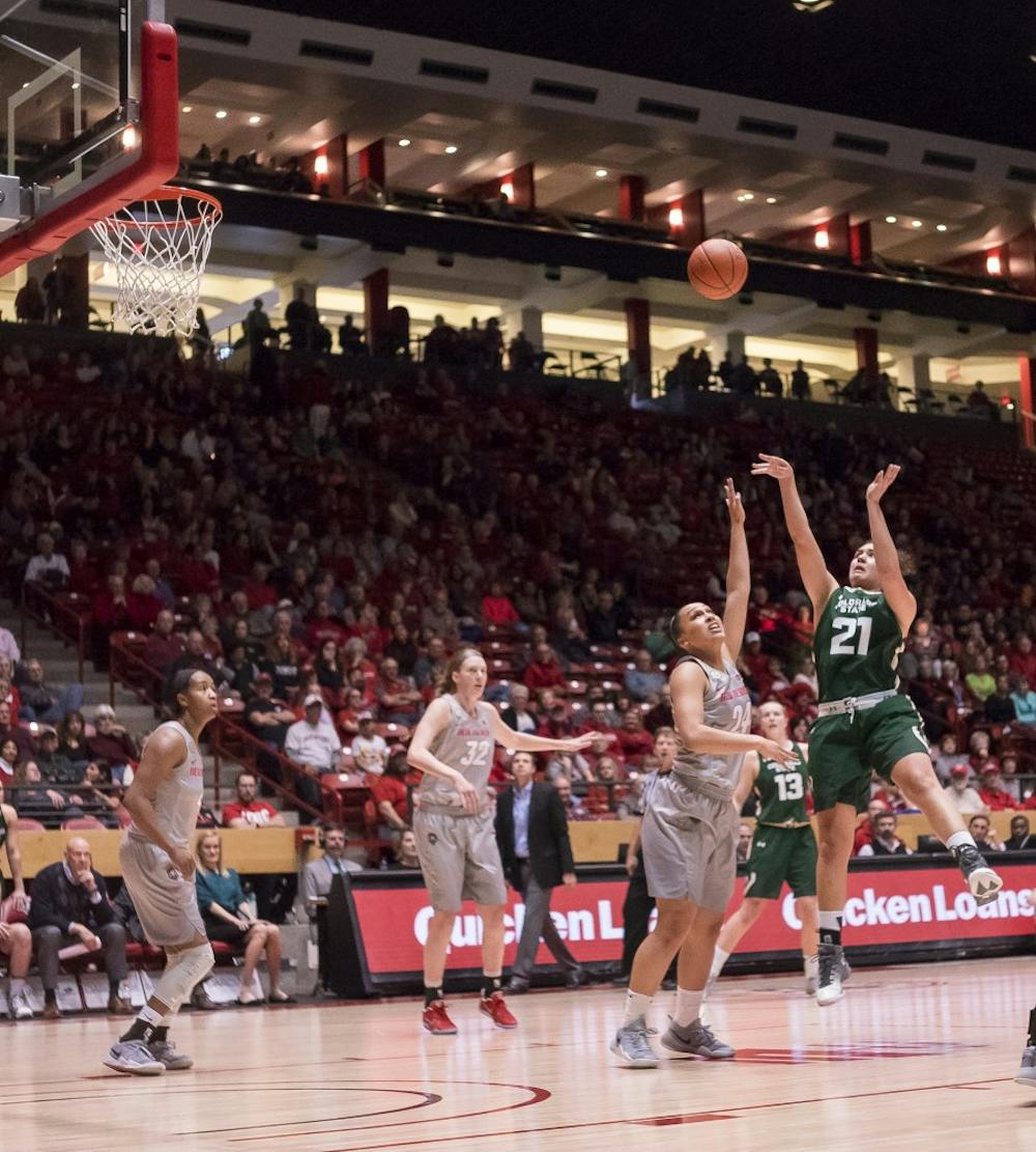 Colorado State guard Myanne Hamm shoots over Lobo defender Jayda Bovero on  Saturday, Jan. 14, 2016 at WisePies Arena. The Lobos lost to Colorado State 78-63.