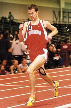 Lobo distance runner Frank Hemingway finishes 14th in the  one-mile run at the UNM Invitational on Jan. 28 at the Albuquerque Convention Center's indoor track.