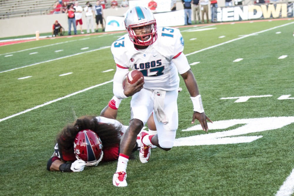 New Mexico quarterback Lamar Jordan breaks away from a Fresno State defender during last Friday’s game at University Stadium. The University of Texas at San Antonio will host the Lobos Saturday at the Alamodome.