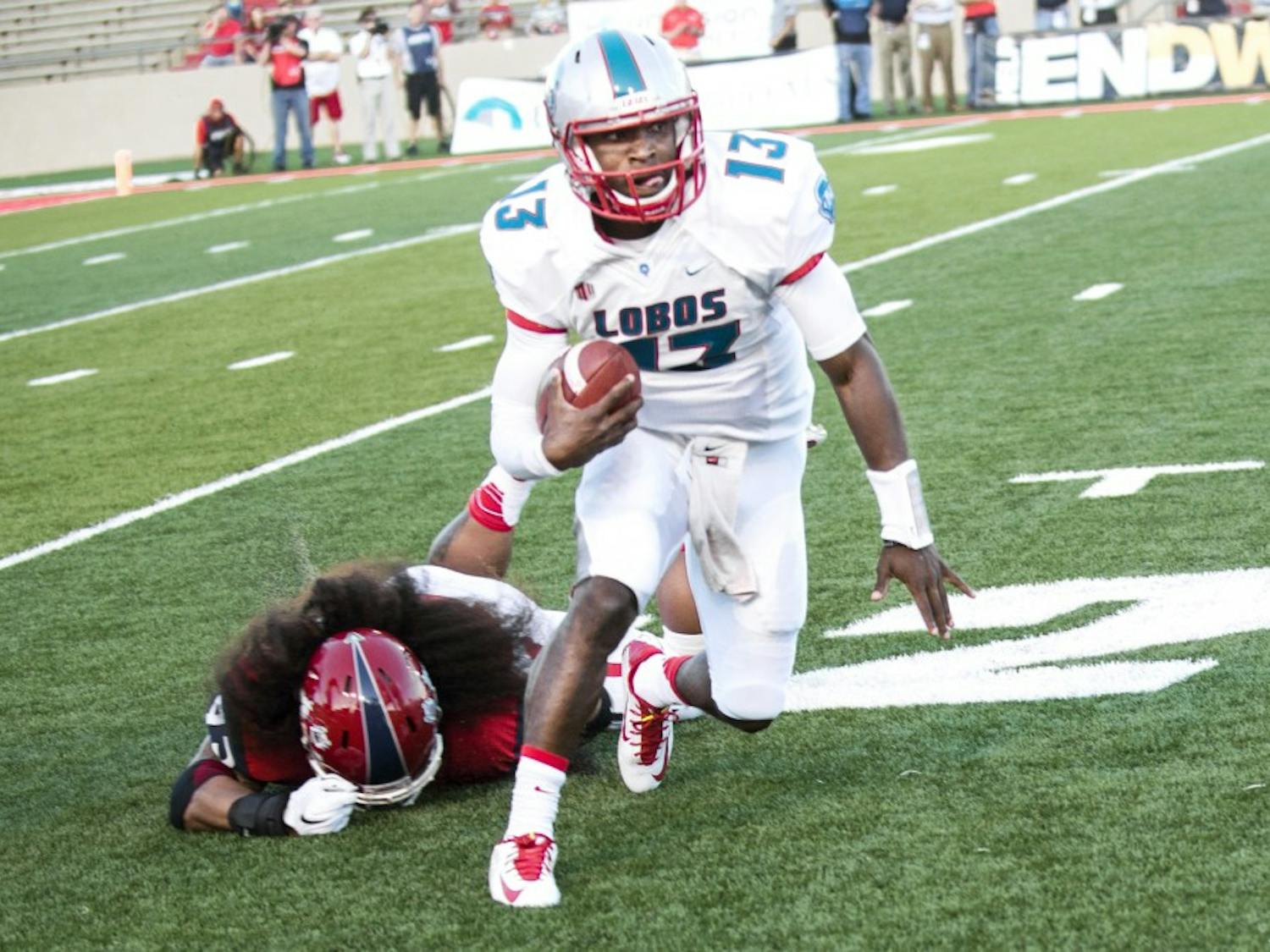 New Mexico quarterback Lamar Jordan breaks away from a Fresno State defender during last Friday’s game at University Stadium. The University of Texas at San Antonio will host the Lobos Saturday at the Alamodome.