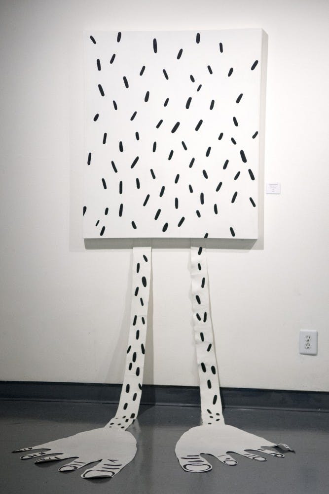 	Lindsey Schmitt’s art piece titled “Wannabe” hangs in the University of New Mexico’s John Sommers Gallery. The piece is part of Schmitt and James Meara’s collaborative show, Cloak &amp; Dagger.