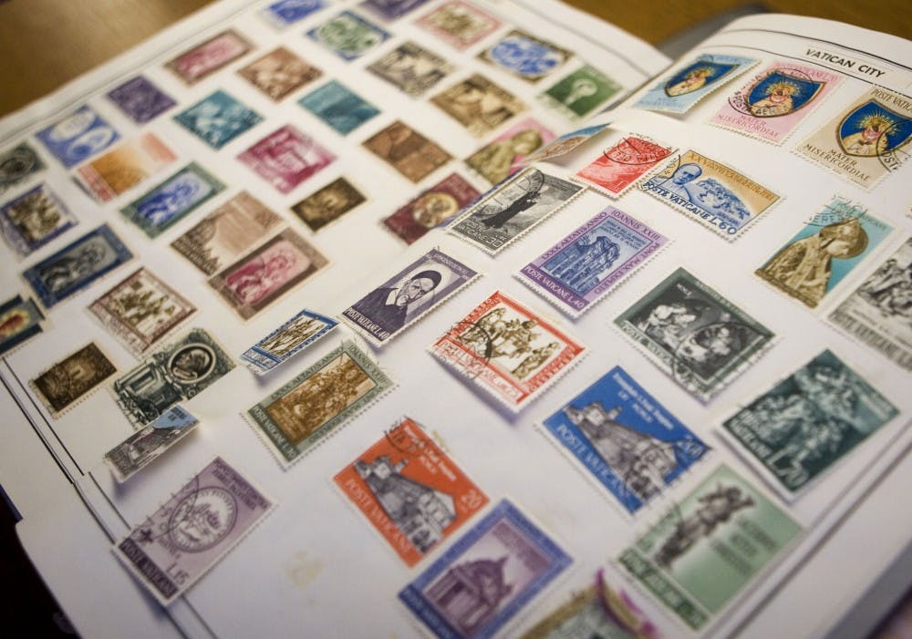 	Stamps belonging to collector Don Swartz are displayed, most of which come from Vatican City. Swartz said he has stamps ranging from price from 50 cents to $1,800 per stamp.