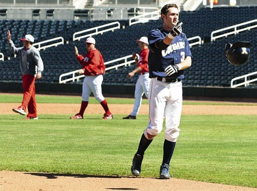 BYU's Stetson Banks flips his helmet in disgust on Saturday at Isotopes Park. The Cougars were victimized by a five-run seventh inning from the Lobos and lost 9-5.