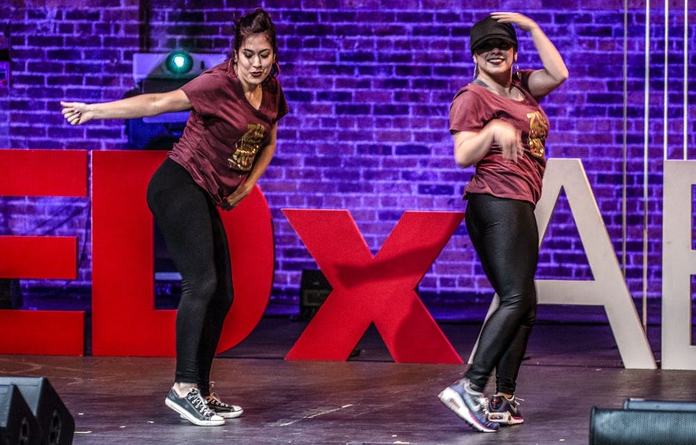 Crystal Zamora, left, and Amanda Valdez perform during the TEDxABQWomen event held at the KiMo Theatre, Nov. 2, 2017.