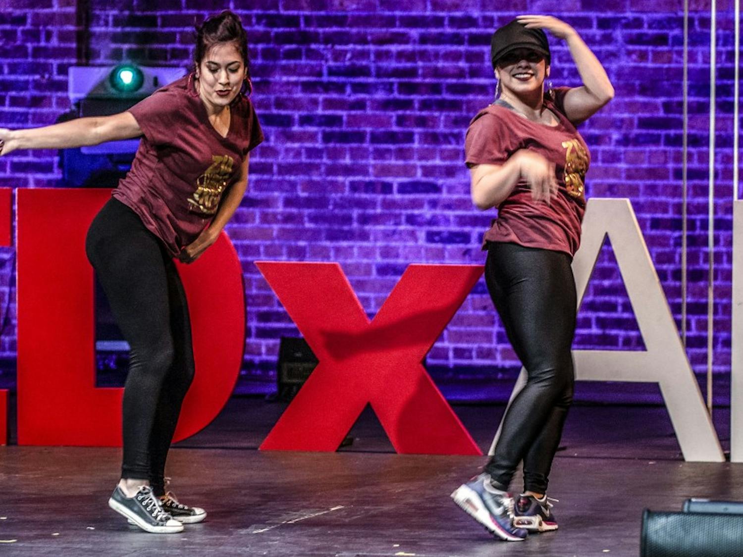 Crystal Zamora, left, and Amanda Valdez perform during the TEDxABQWomen event held at the KiMo Theatre, Nov. 2, 2017.