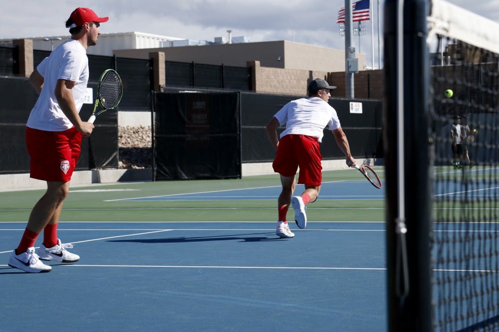 Bart Van Leijsen (left) and Hayden Sabatka finish off a doubles match at the Mckinnon Family Tennis Center Oct. 23. Van Leijsena and Sabatka&nbsp;lost their semifinal set to&nbsp;Texas Tech’s Hugo Dojas and Felipe Soares at the 2015 USTA/ITA Indoor Tennis Championships last Saturday.&nbsp;