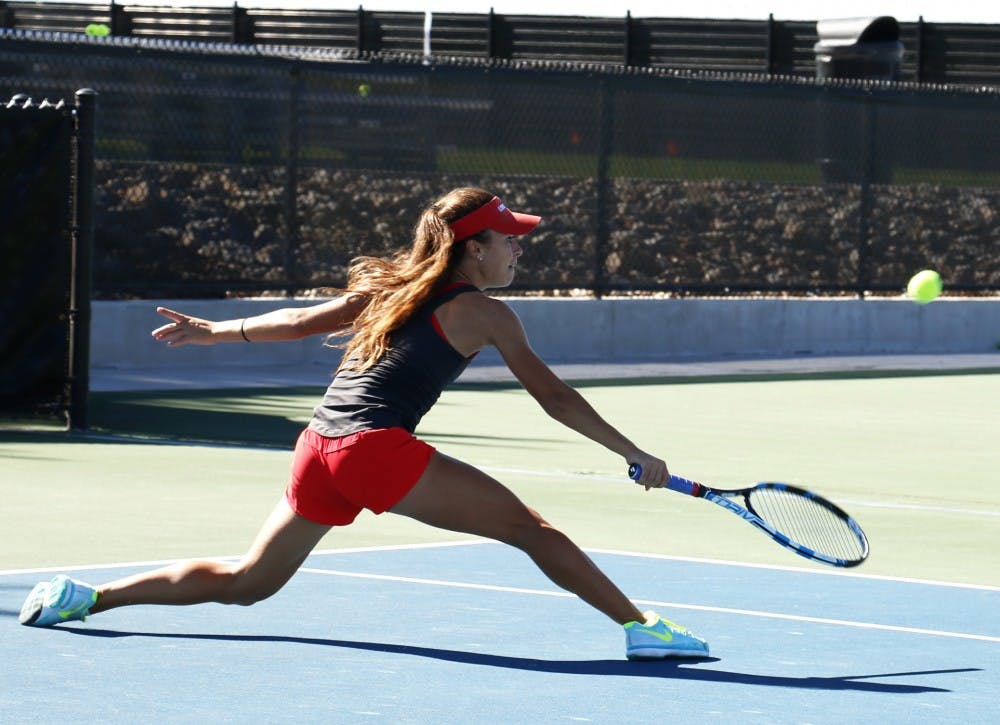 Sophomore Sharon Coone lunges for the ball against a UTEP player at the McKinnon Family Tennis Center Sunday Nov. 1. The Women's tennis team will return in the spring after not qualifying for the UTSA/ITA.