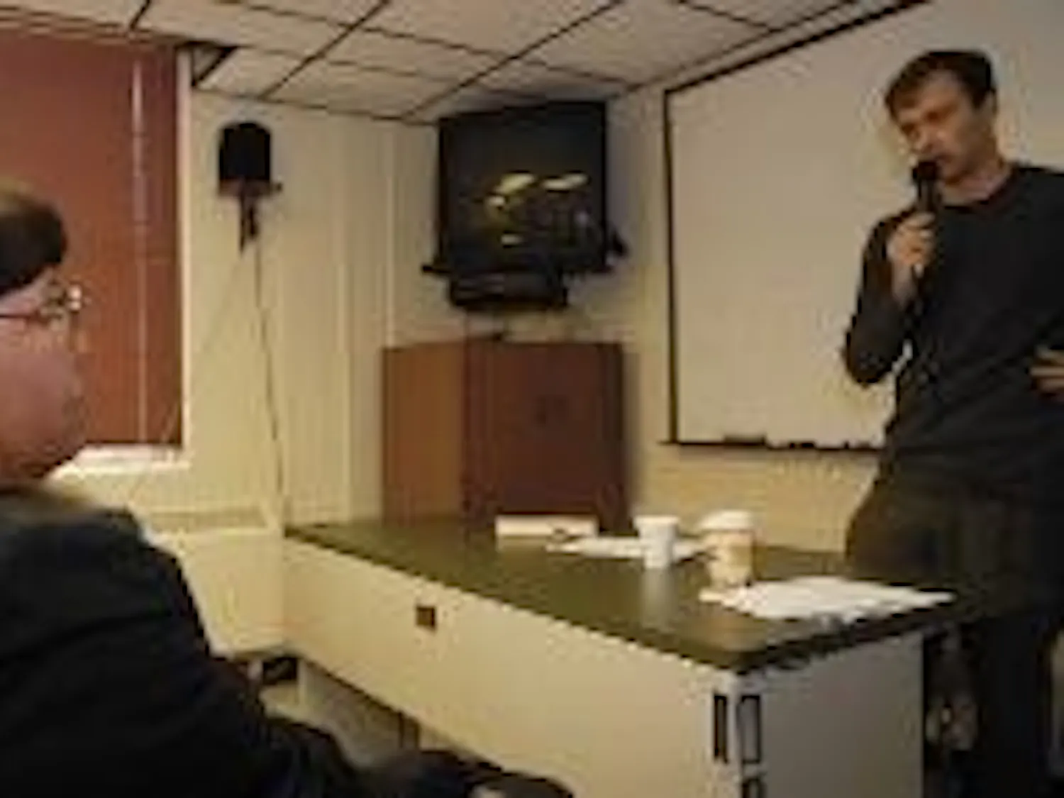Author Steve Hendricks answers audience member Eva Gardipe's question about his book The Unquiet Grave after his lecture in Mesa Vista Hall on Tuesday.