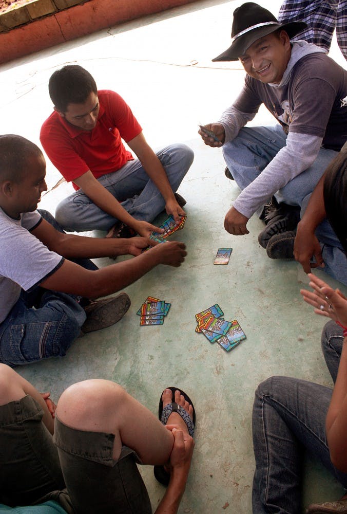 	Honduran immigrants seeking refuge in Mexico play cards in a safe house in Ixtepec, Mexico, on July 16. If their refugee status is denied, they said they plan to come to America.