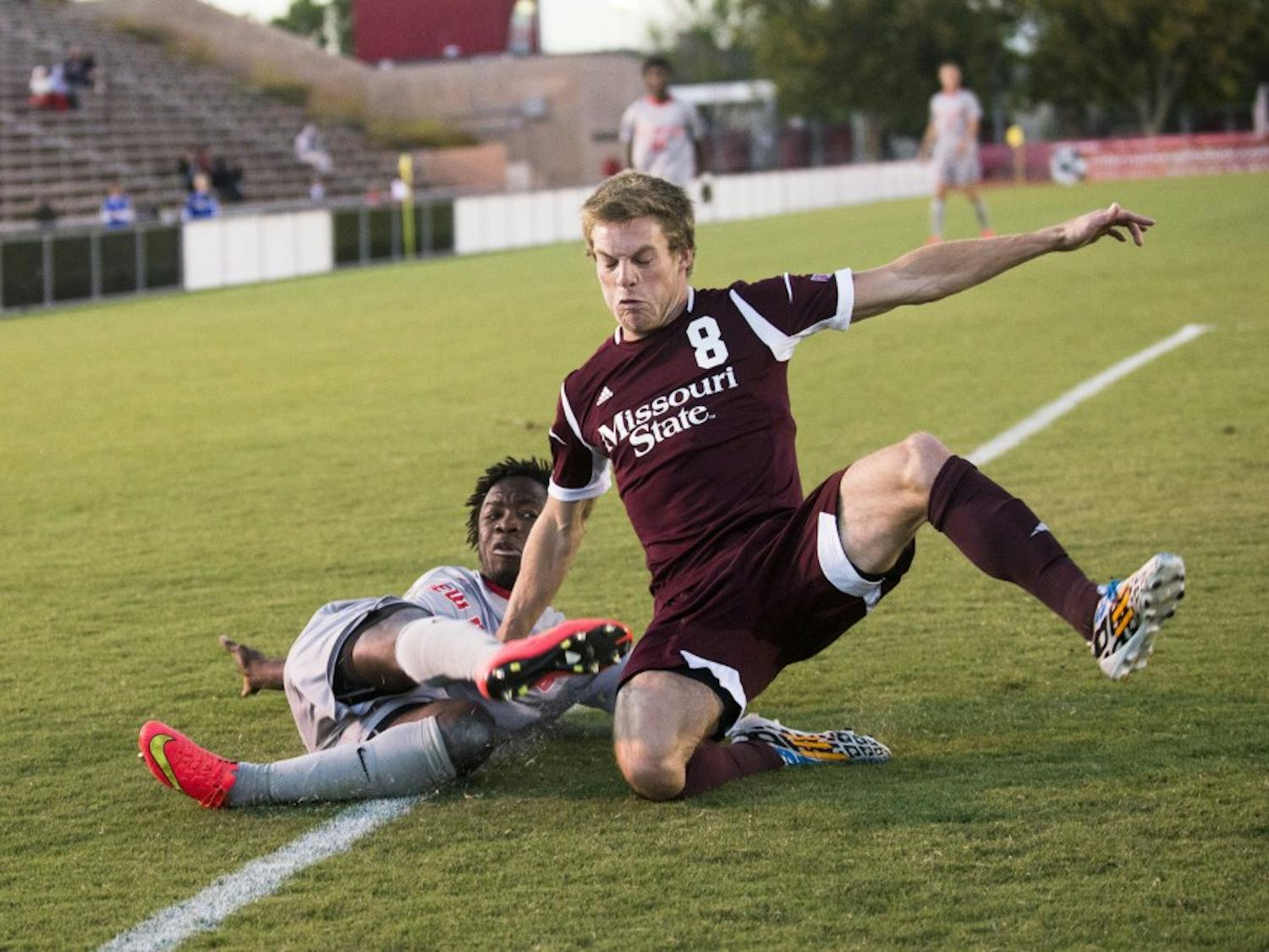 New Mexico forward James Rogers (7) kicks the ball away from Missouri State midfielder Parker Maher during the Oct. 12 game. New Mexico will play Old Dominion at 7 p.m. on Saturday at the UNM Soccer Complex.