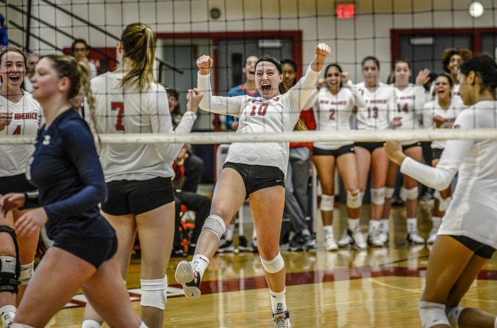 Lauren Twitty, No. 10, celebrates with Victoria Spragg, No. 7, after Spragg scores against Utah State in Johnson Center Sept. 30, 2017. 