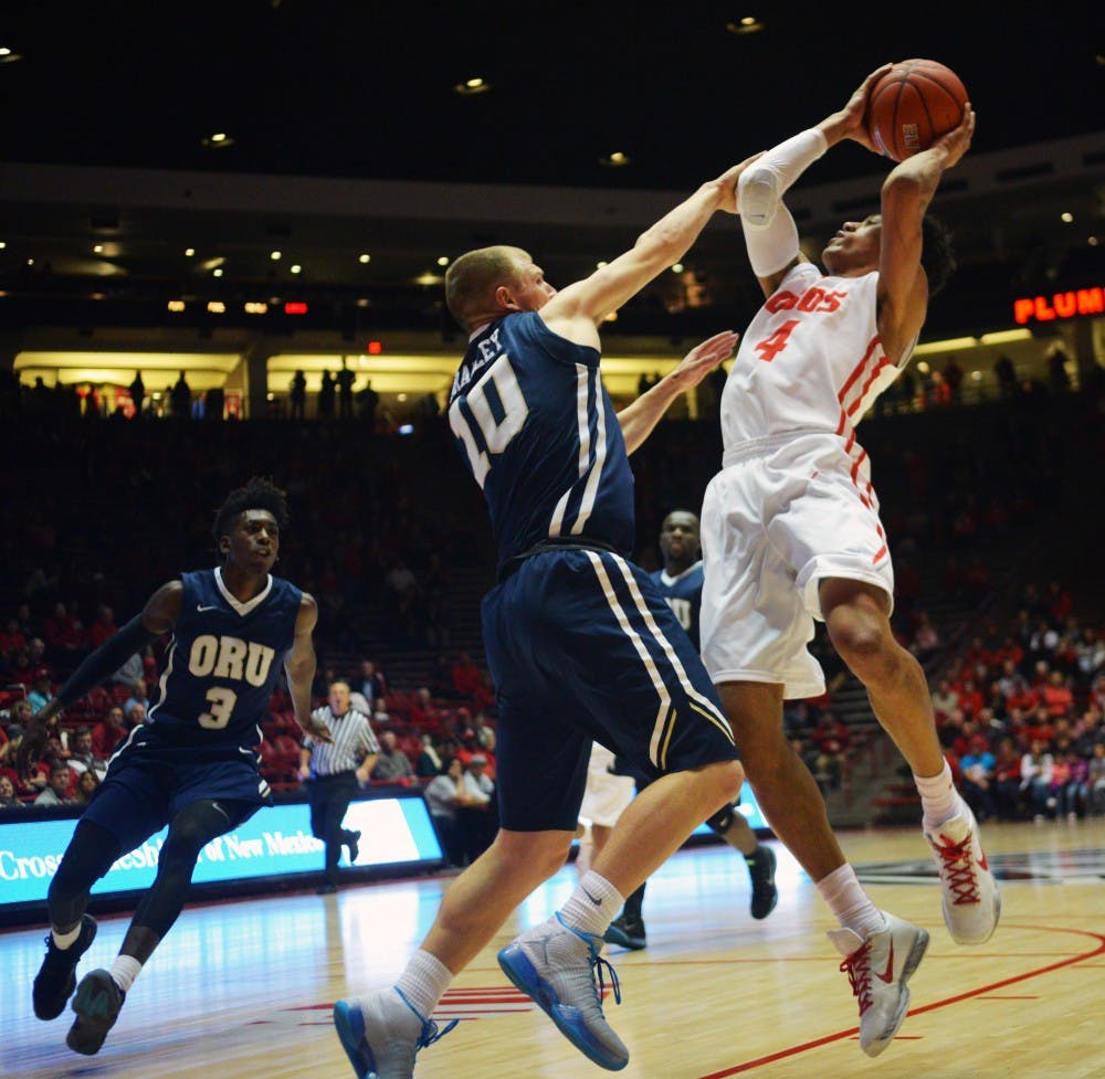 Redshirt sophomore guard Elijah Brown goes in for a close range jump shot at WisePies Arena Tuesday night. The Lobos beat Oral Roberts 91-75.&nbsp;