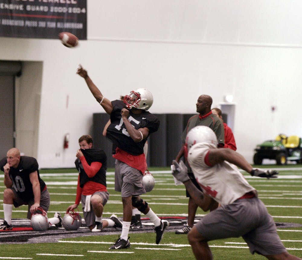	Donovan Porterie launches a ball downfield during Tuesday’s practice at the Indoor Practice Facility. Head coach Mike Locksley has yet to name a starting quarterback, but Porterie is the front-runner.