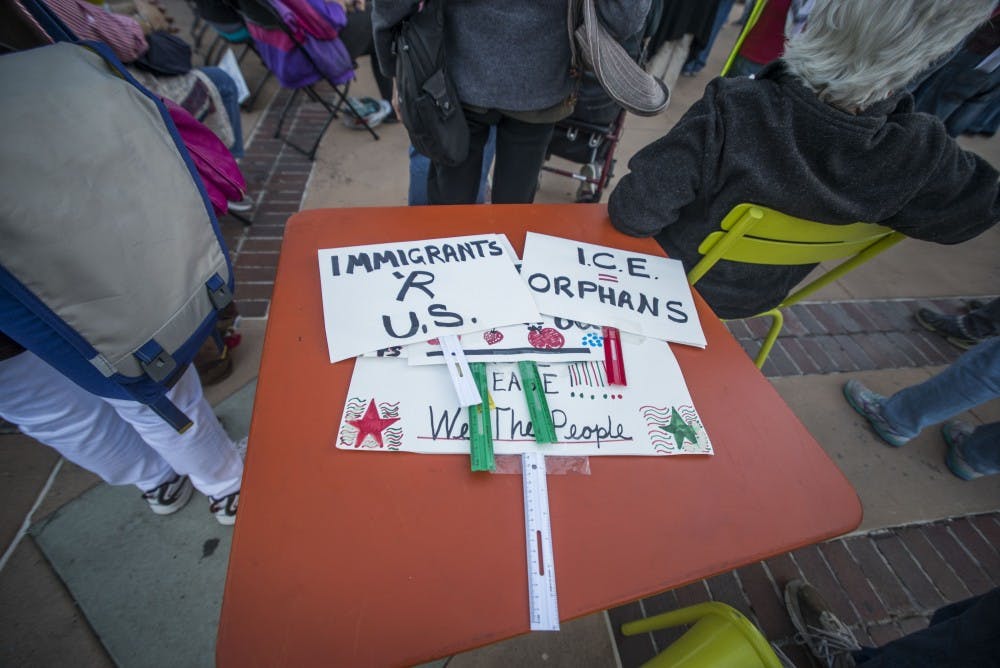 Signs made out of rulers and construction paper sport pro-immigration quotes on Tuesday, Feb. 21, 2017 at Civic Plaza.