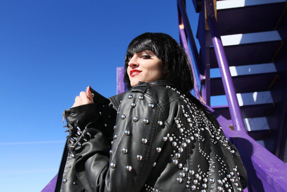 	Sara Siemers shows off her hand-studded leather jacket. It mimics the jacket of the Yeah Yeah Yeahs lead singer Karen O. 