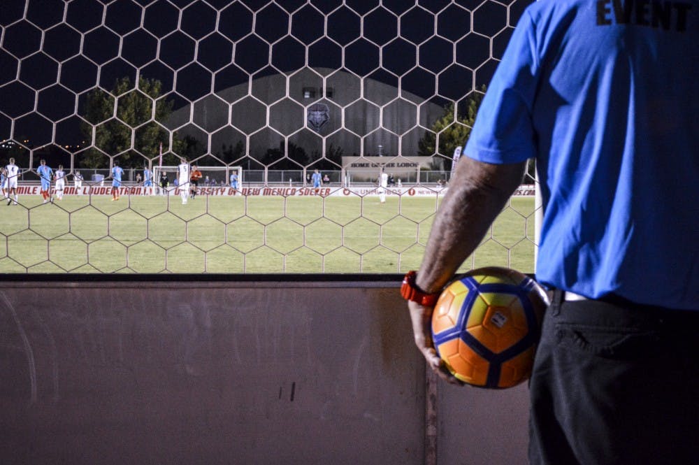 Event staff watch the UNM Men's Lobo Soccer team play Old Dominion on Sept. 15, 2018.&nbsp;