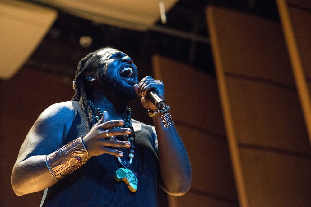 Trice Be “Phantom Magnetiq” sings Molodi’s rendition of “Feeling Good” at Keller Hall on Sept. 11. Molodi incorporates collegiate stepping with body percussion and various forms of music and dance in their performance. 