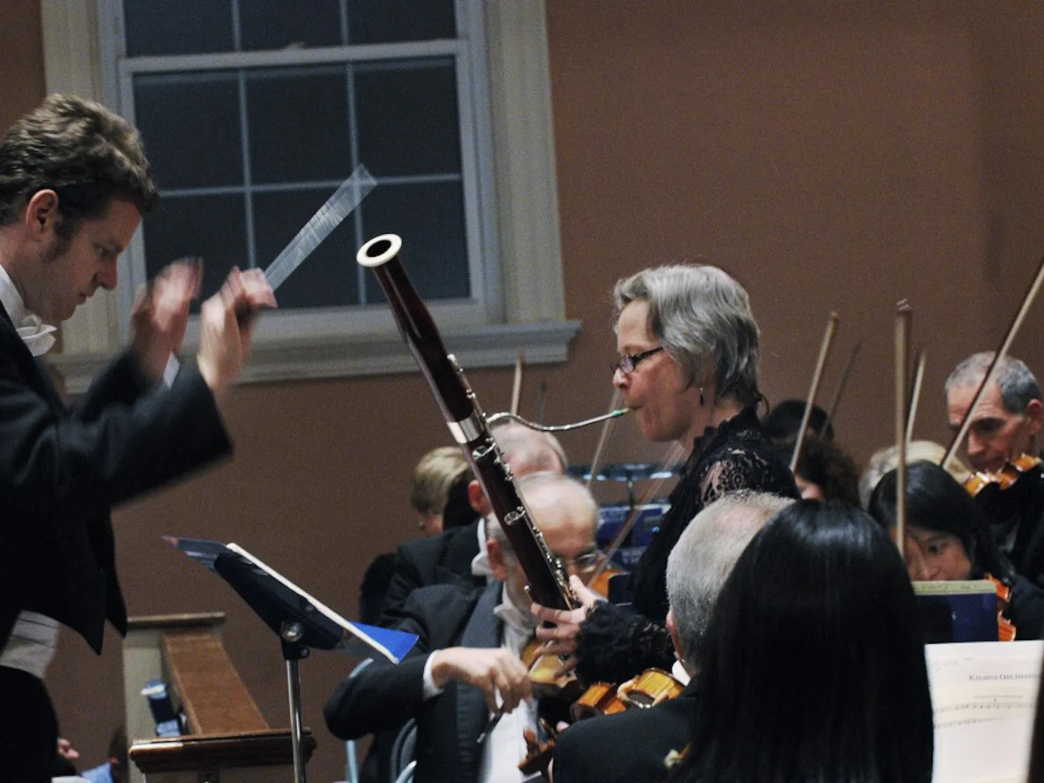 NMSO Player’s Association conductor David Feldberg directs bassoon soloist Stefanie Przybylska during their Nov. 1 performance at Presbyterian Church.