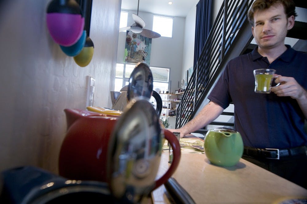 	Owner David Edwards in the New Mexico Tea Bar on Sunday. Edwards offers tea for two, which includes a pot of tea, a blueberry muffin, a scone and an assortment of fruit.