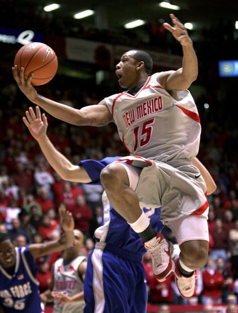 Lobo J.R. Giddens lays up the first basket of the game 5:18 into the first half Saturday. The Lobos held Air Force to 11 of 40 shots for the night.